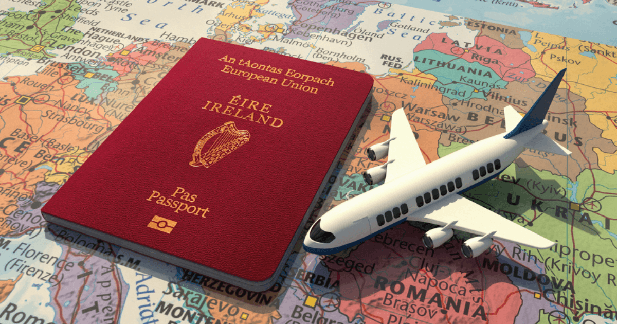 Canna emigration: An Irish passport lying on a map with a small toy airplane next to it