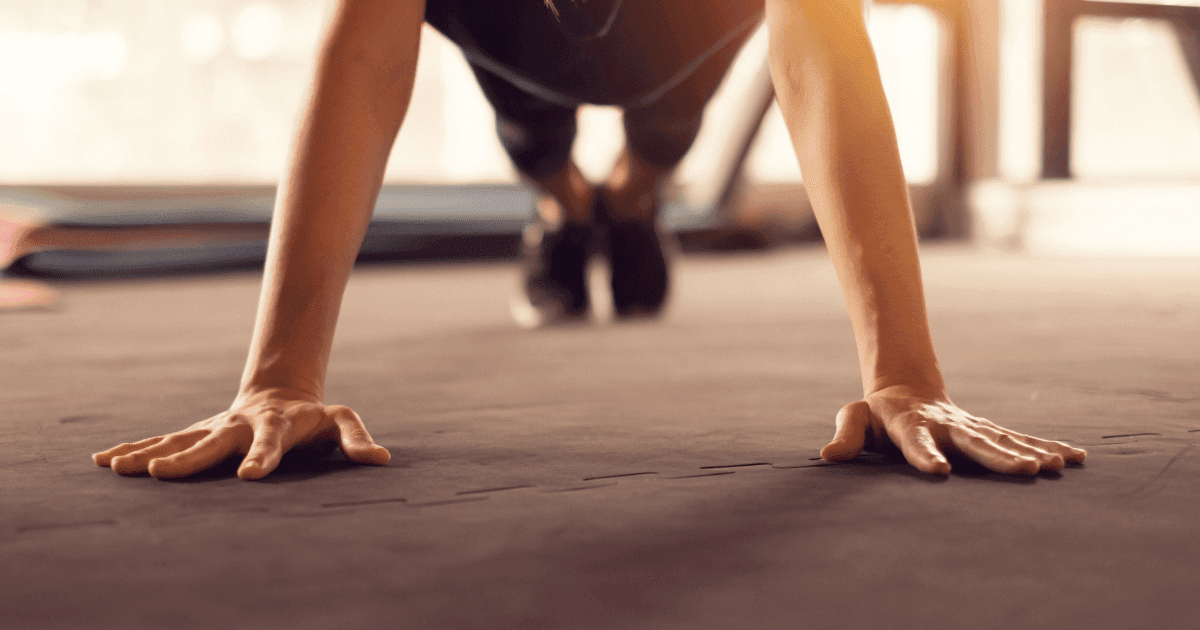 Working out: A person holding their body in the plank position