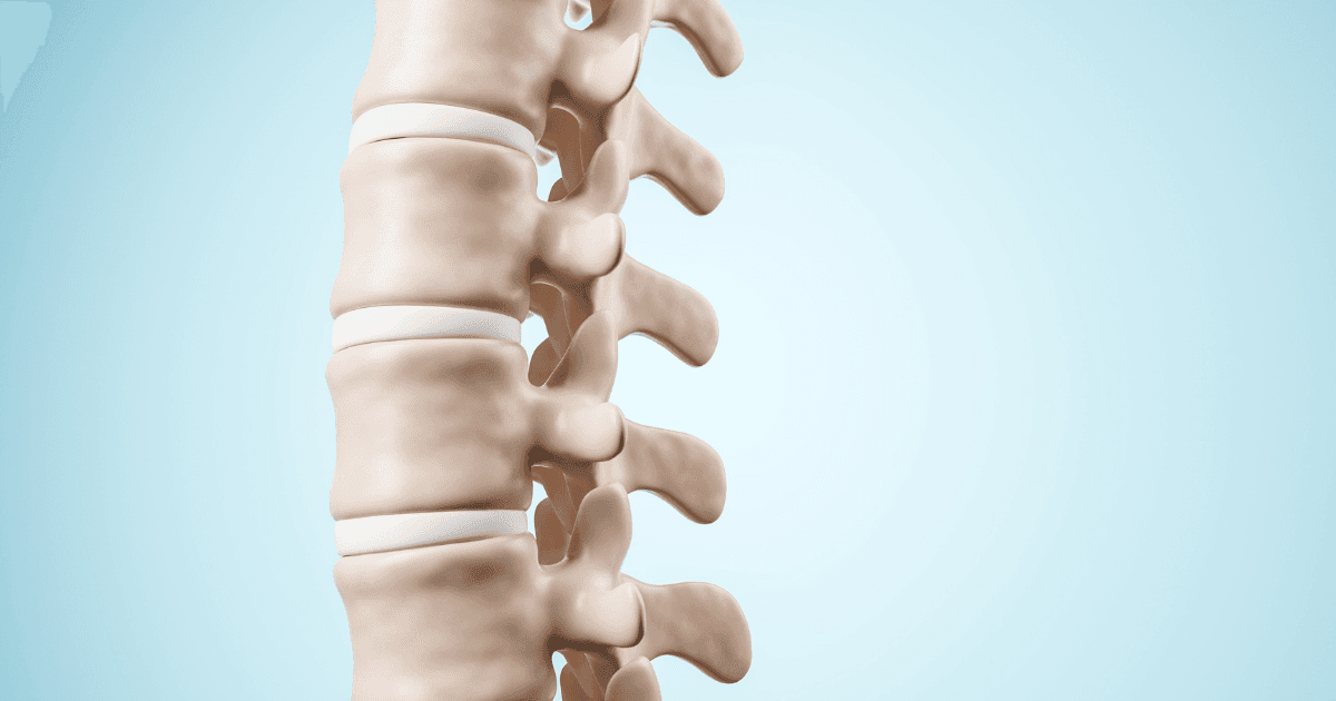 Spine-related pain: A white skeleton spine against a blue background