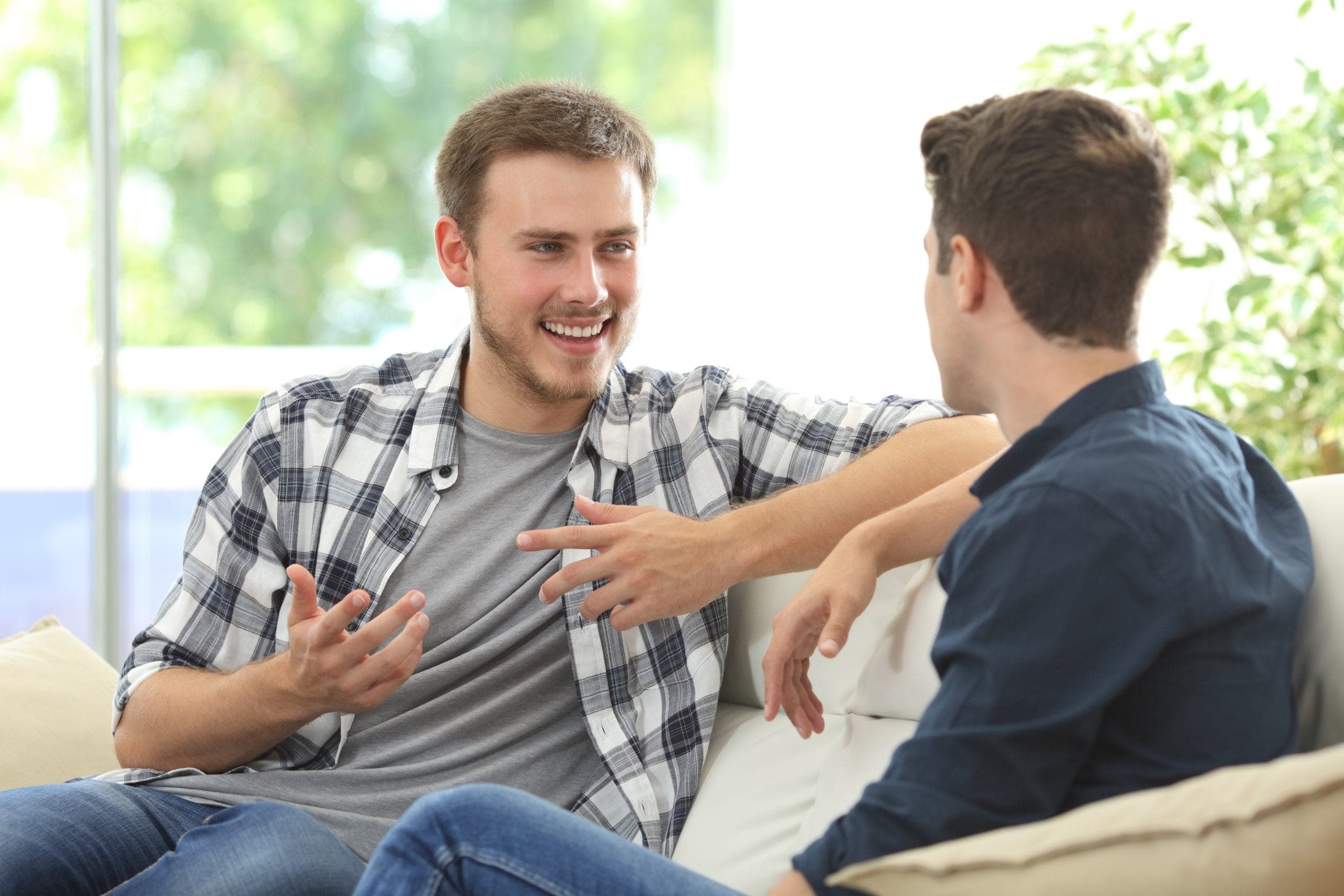Speech: Two men sitting discussing something together