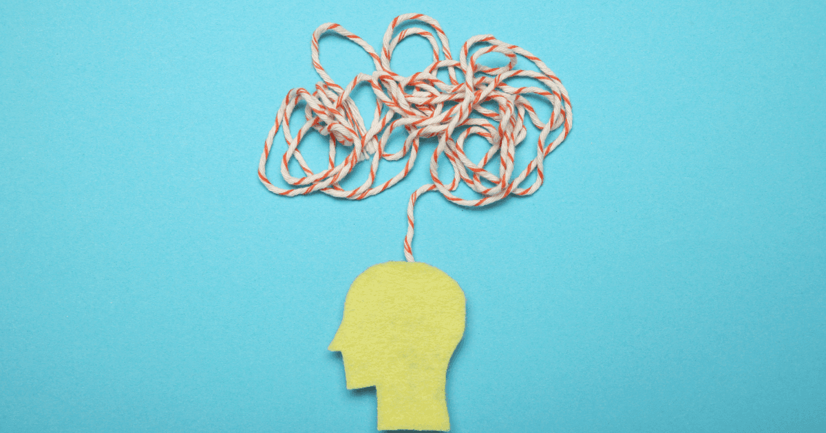 ADHD: A blue background with a cartoon head with a string jumbled up above it to represent thoughts