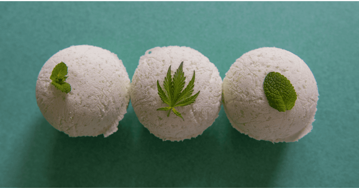 Skin: Three bath bombs with cannabis leaves on a blue background