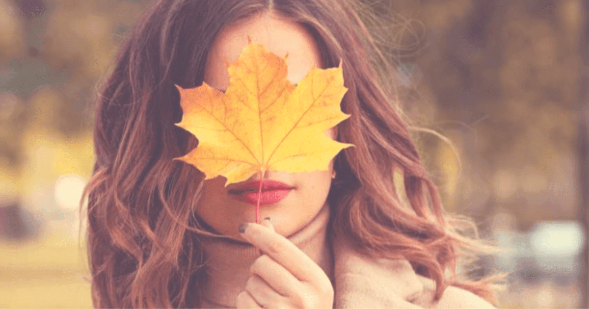 Skincare: A woman holding a leaf over her face