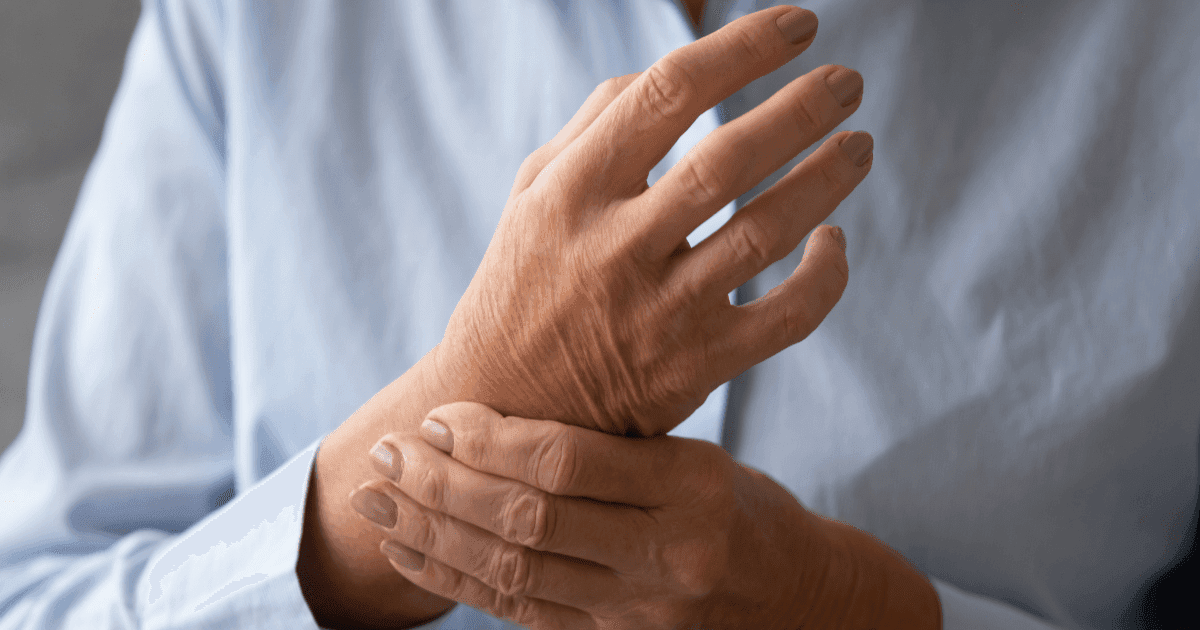 Arthritis pain: A woman holding her hands