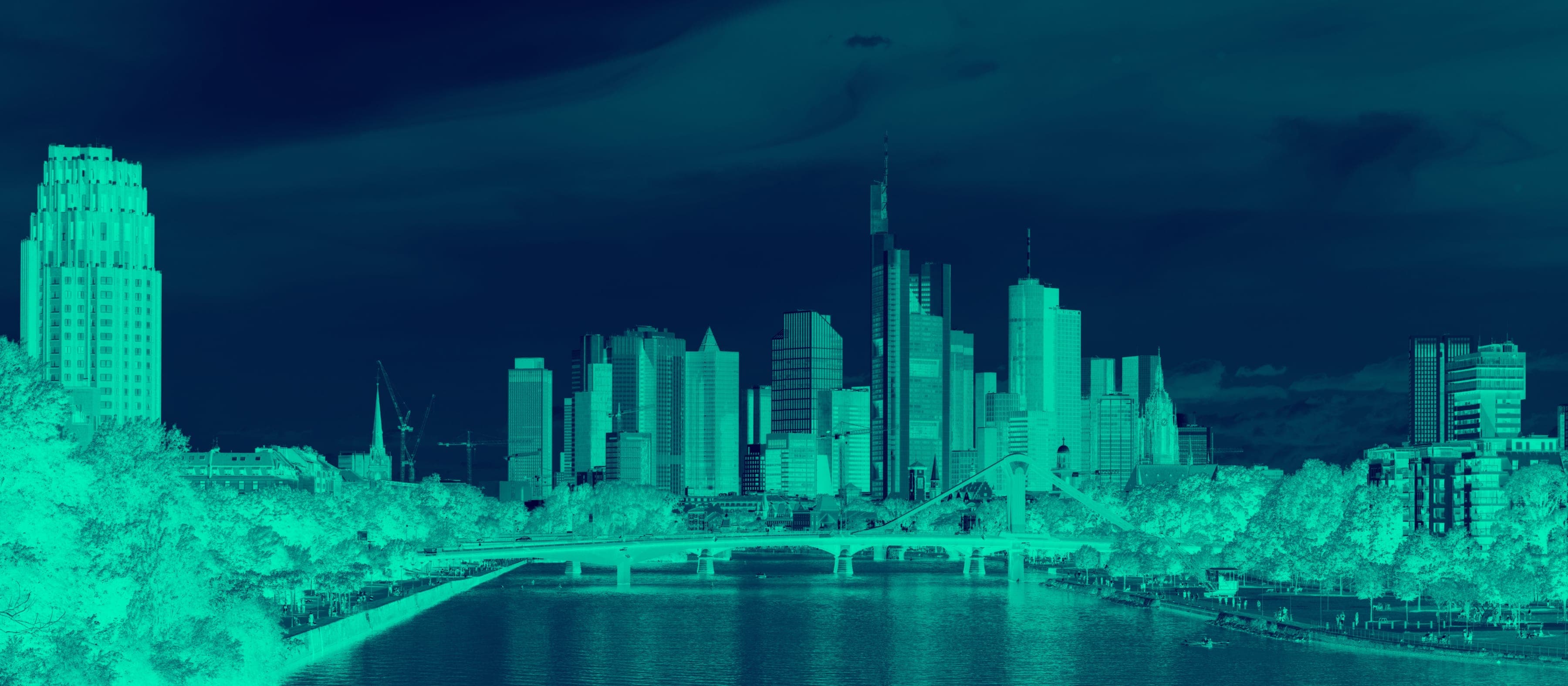 The Frankfurt skyline and the River Main, in the Cannabis Health mint duotone.