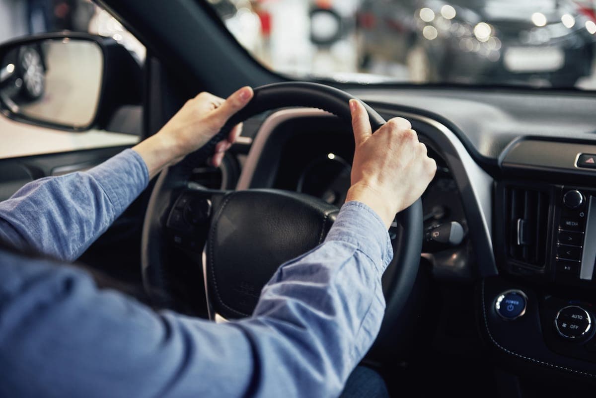 Person driving a car