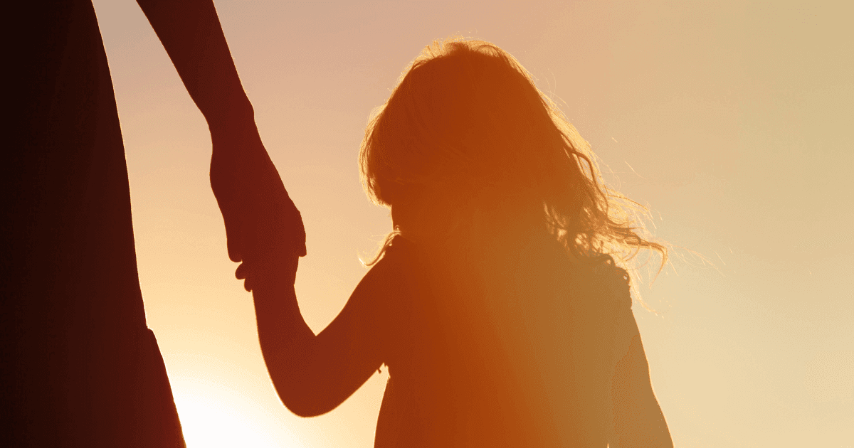 Cannabis, fibromyalgia, endometriosis and me: a young girl walking with her mother against a sunset