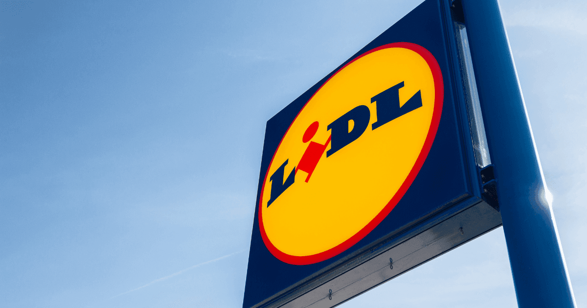 Lidl: A sign for German brand Lidl against a clear blue sky