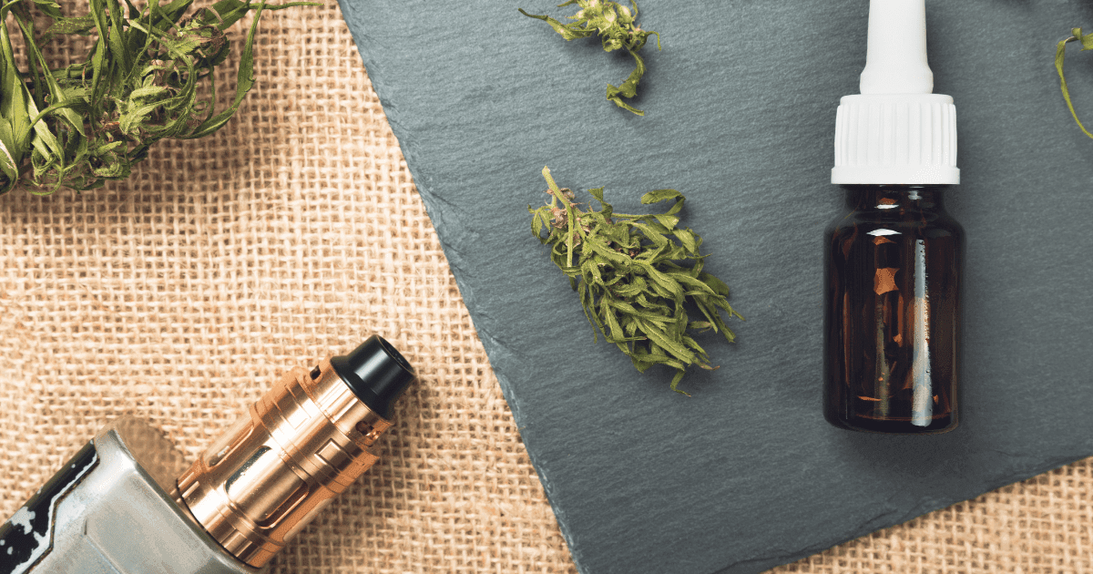 EVALI: A vape device next to an e-liquid which has no label.