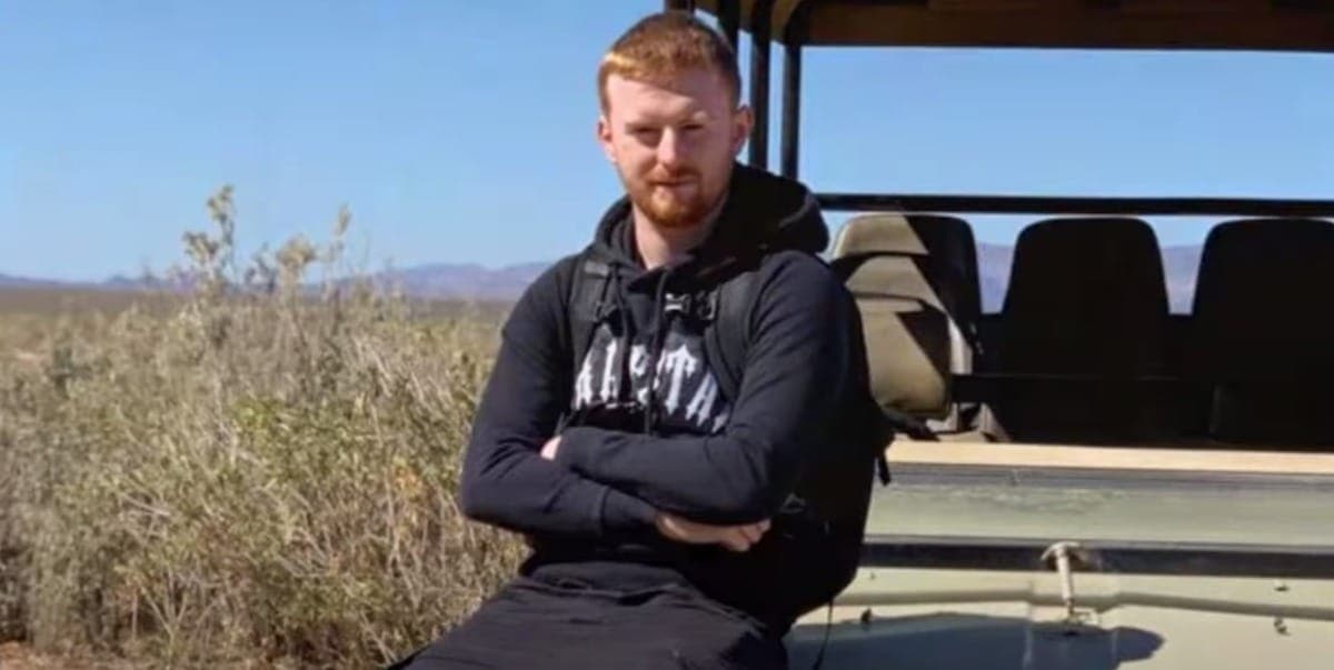 Dubai: An image of a man with red hair sitting in the sun