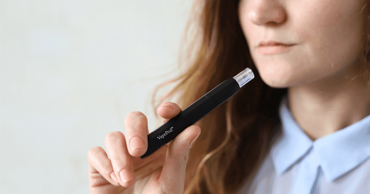 Terpenes: A person holding a Kanabo vape