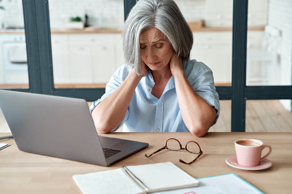 Woman with fibromyalgia experiencing neck pain