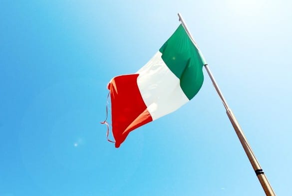 Referendum in Italy: An Italian flag flies against a blue sky