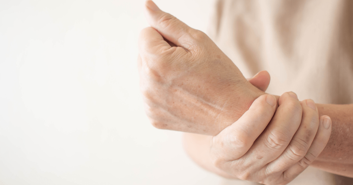 Arthritis: A hand holding a wrist in pain