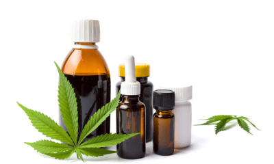 Treatment-resistant stuttering: A cannabis leaf lies in front of a brown glass bottle with other medical bottles with white lids contain CBD oil