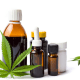Treatment-resistant stuttering: A cannabis leaf lies in front of a brown glass bottle with other medical bottles with white lids contain CBD oil
