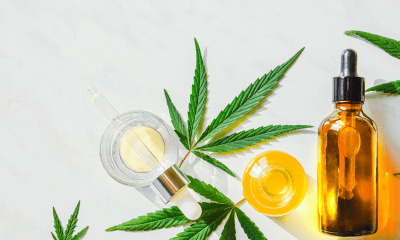 Epidiolex: A cannabis leaf with a yellow bottle of oil beside it