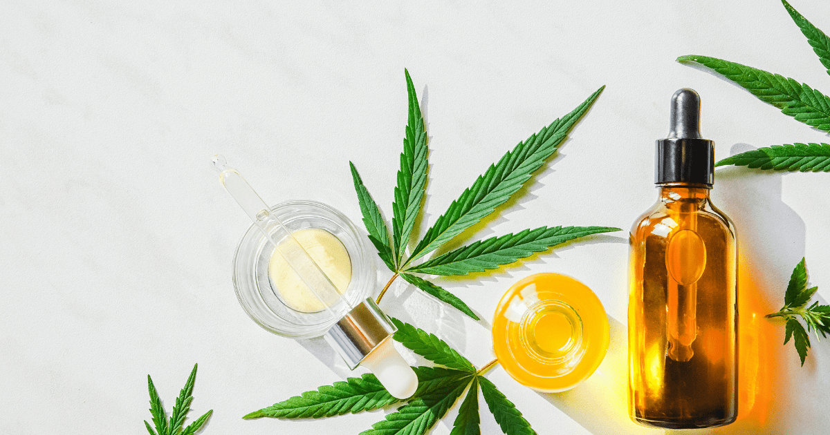 Epidiolex: A cannabis leaf with a yellow bottle of oil beside it