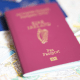 ADHD: An Irish passport lies on top of a blue European document. Both passports are ontop of a map where a pen is marking the route