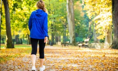 Fibromyalgia: Middle-aged woman walking in city park