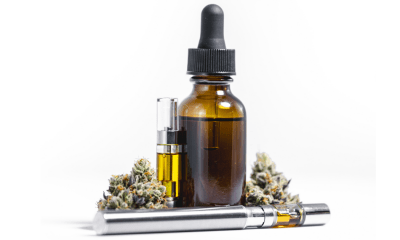 Glioblastoma: A bottle of CBD with a vape. There are two cartridges of CBD e-liquid