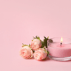 Valentines Day: Can CBD help? Two flowers and a pink candle