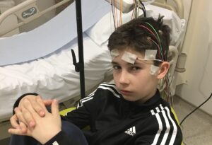 Louis Petit in hospital while receiving treatment for epilepsy